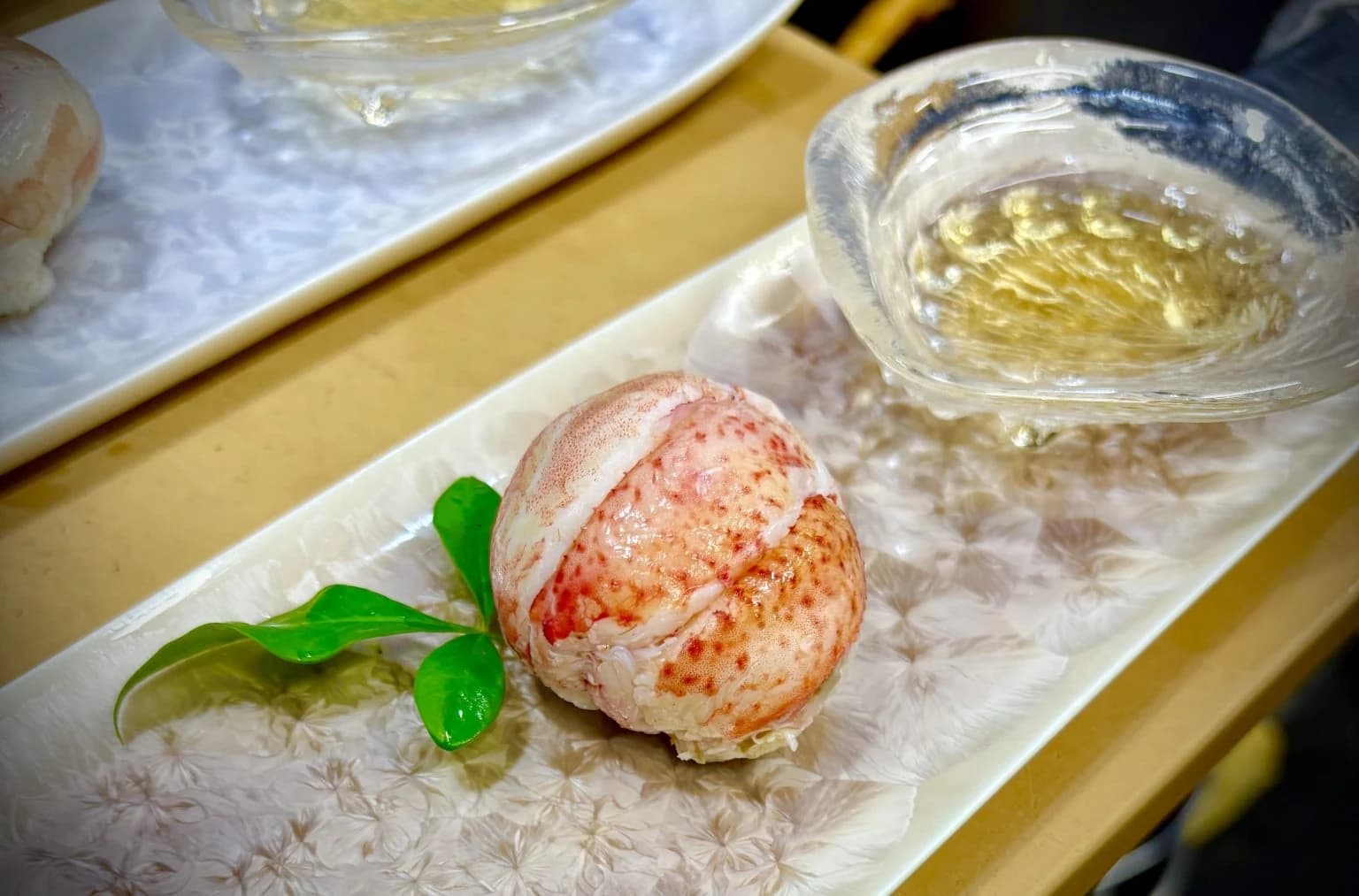 A plated seasonal course with lobster at Wadokoro Miyazawa